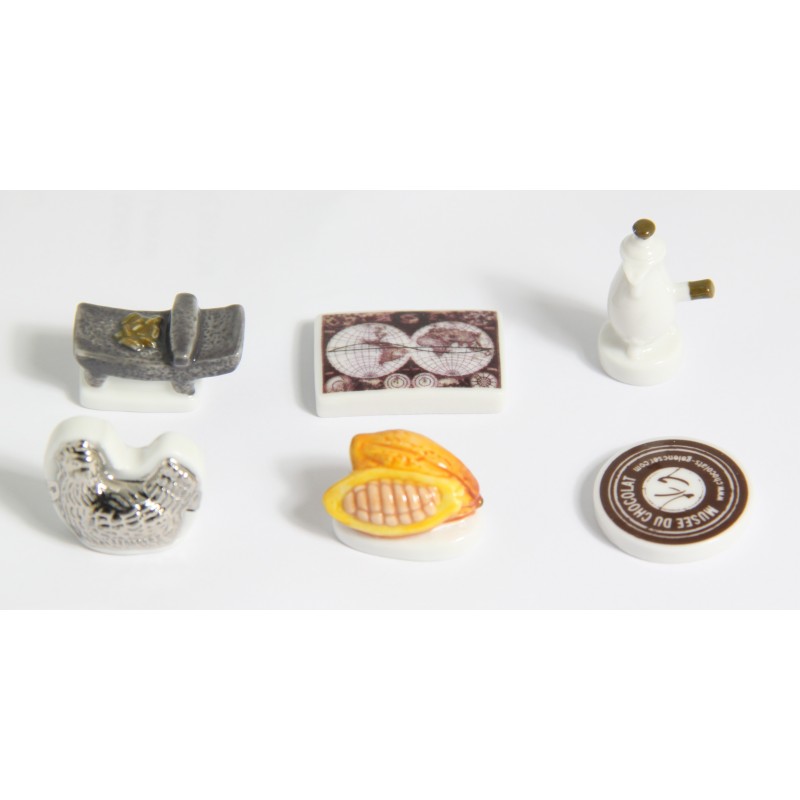 fève en porcelaine, thème musée du chocolat Gelencser fève en porcelaine, thème musée du chocolat Gelencser